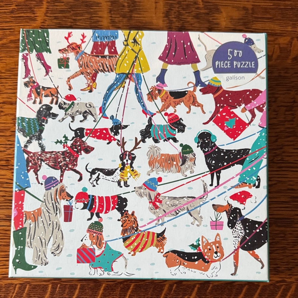 500 Piece “Winter Dogs” jigsaw puzzle by Galison